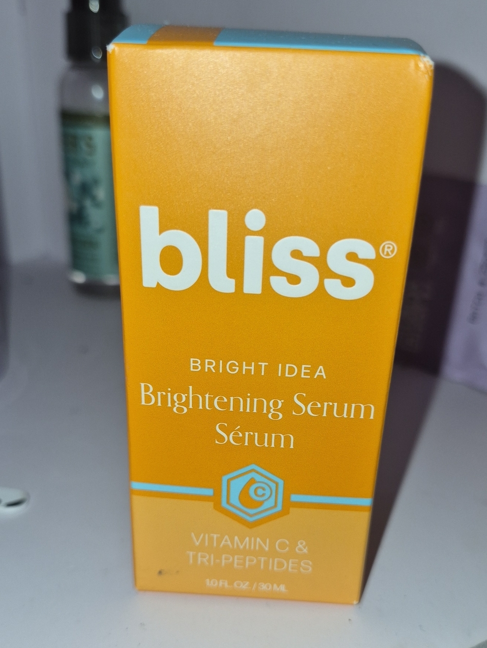 Bliss Bright Idea Brightening Serum - Orange with Blue Accent
